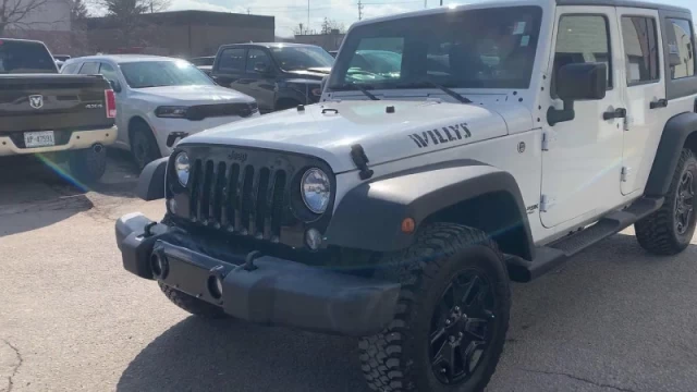 Jeep Wrangler Unlimited Sport  - $144 B/W 2018