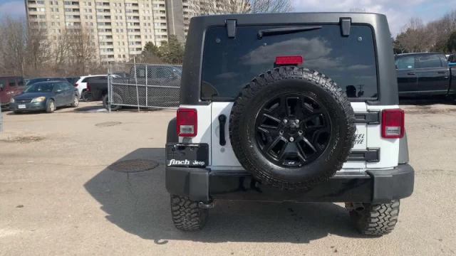 Jeep Wrangler Unlimited Sport  - $144 B/W 2018